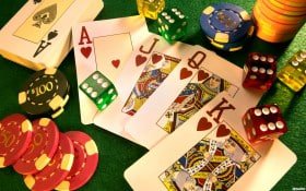 Tampilan layar Wild West Gold dengan simbol koboi dan emas